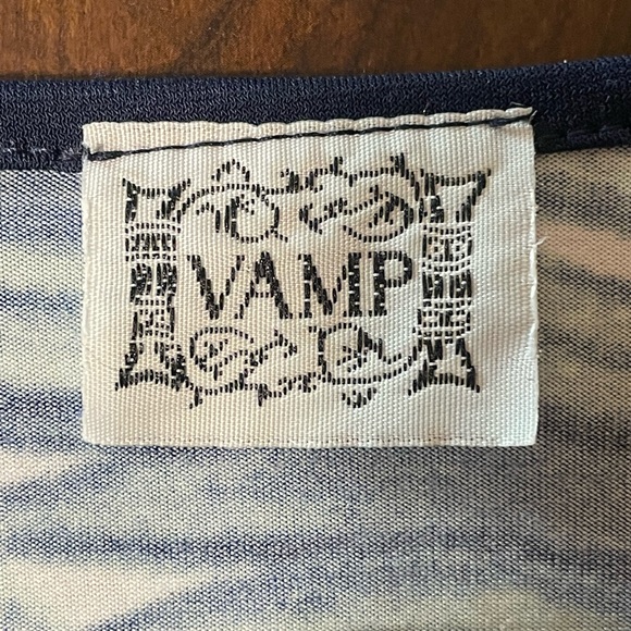 V neck short sleeved shirt in tropical print on a white background. - Picture 3 of 6